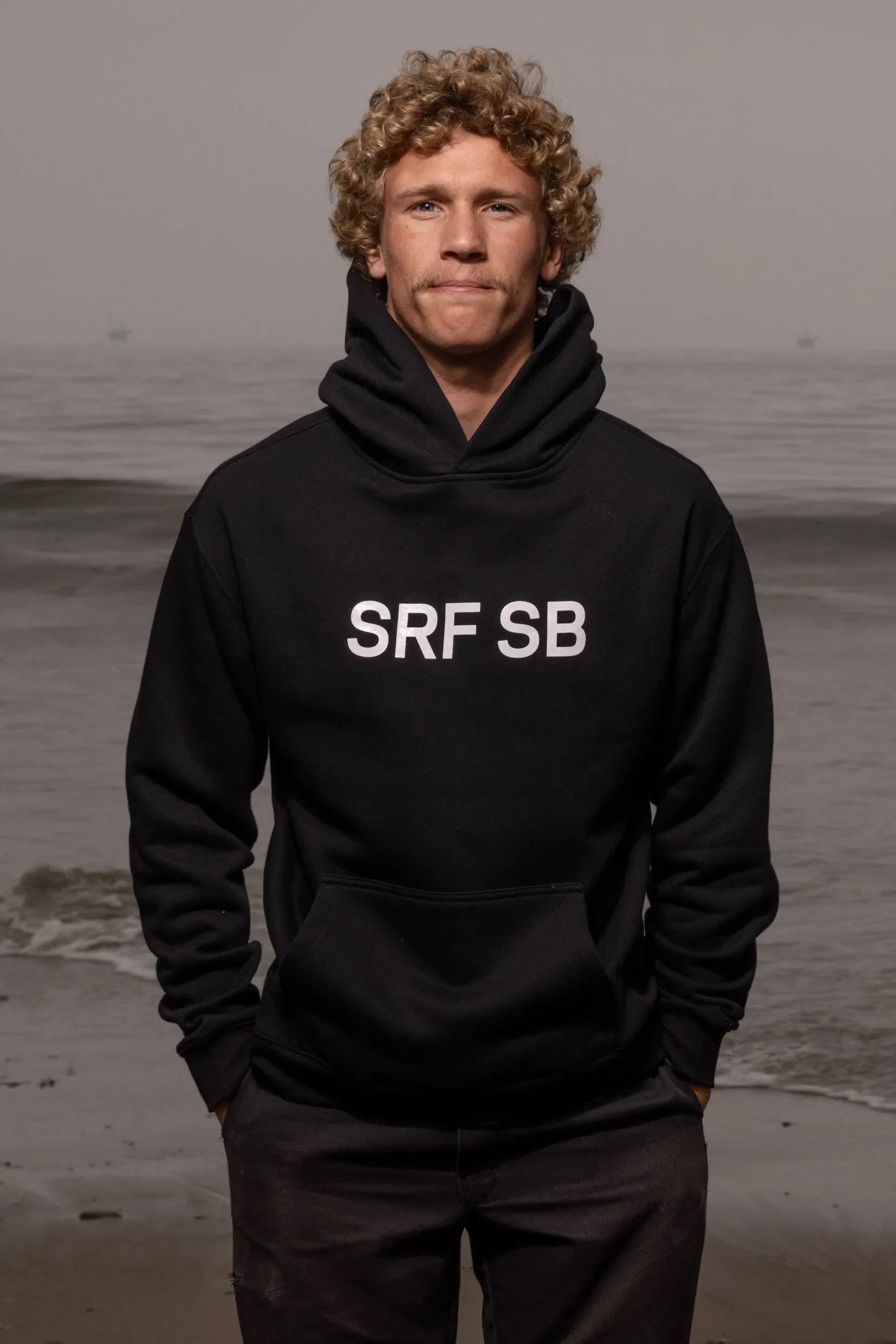 SRF SB Unisex Hoodie - Cream on Black - Heidi Merrick