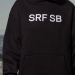 SRF SB Unisex Hoodie - Cream on Black - Heidi Merrick