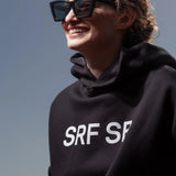 SRF SB Unisex Hoodie - Cream on Black - Heidi Merrick