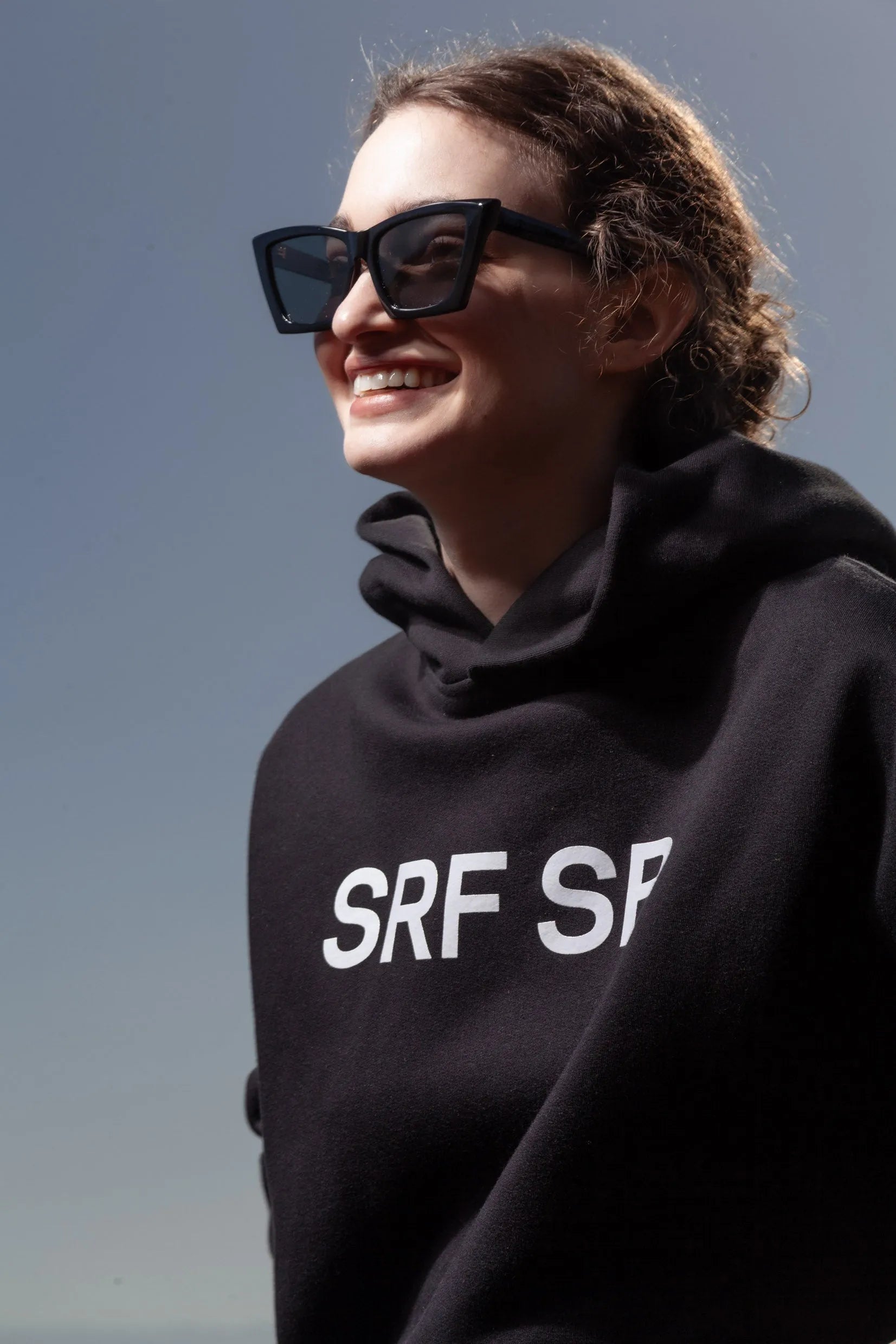 SRF SB Unisex Hoodie - Cream on Black - Heidi Merrick