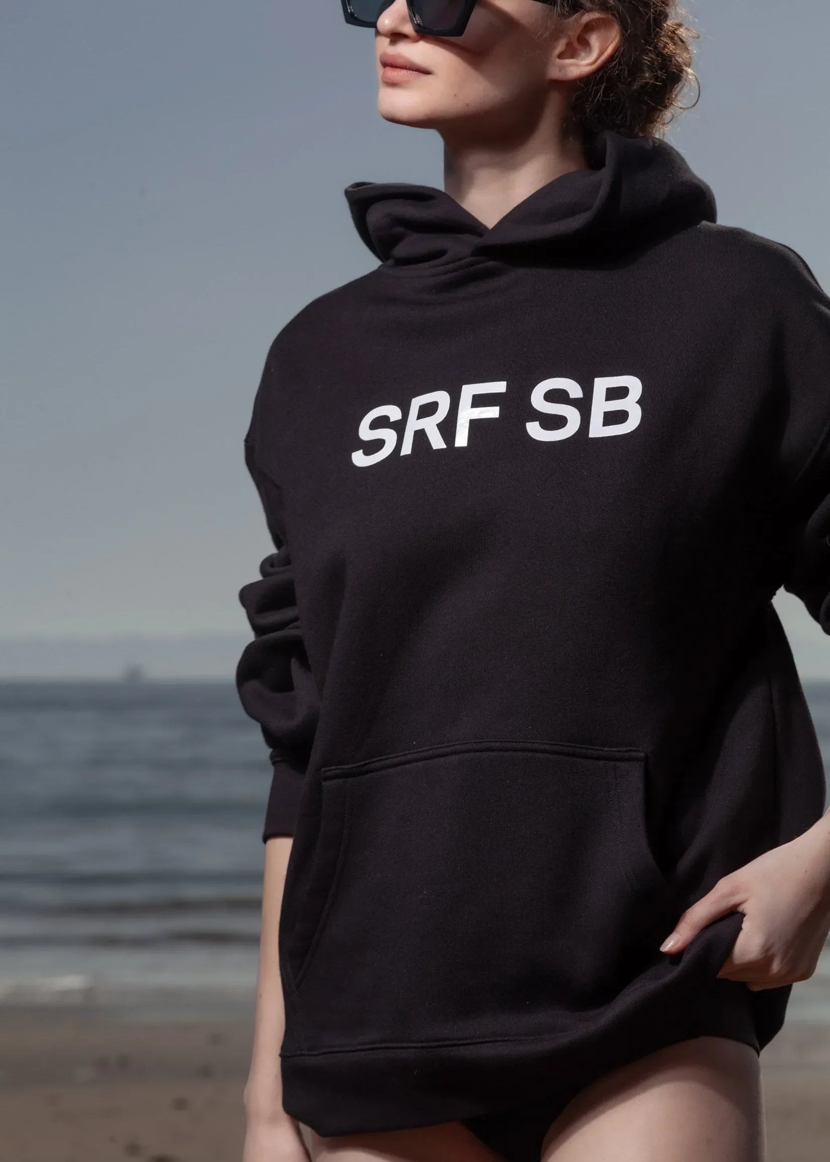 SRF SB Unisex Hoodie - Cream on Black - Heidi Merrick