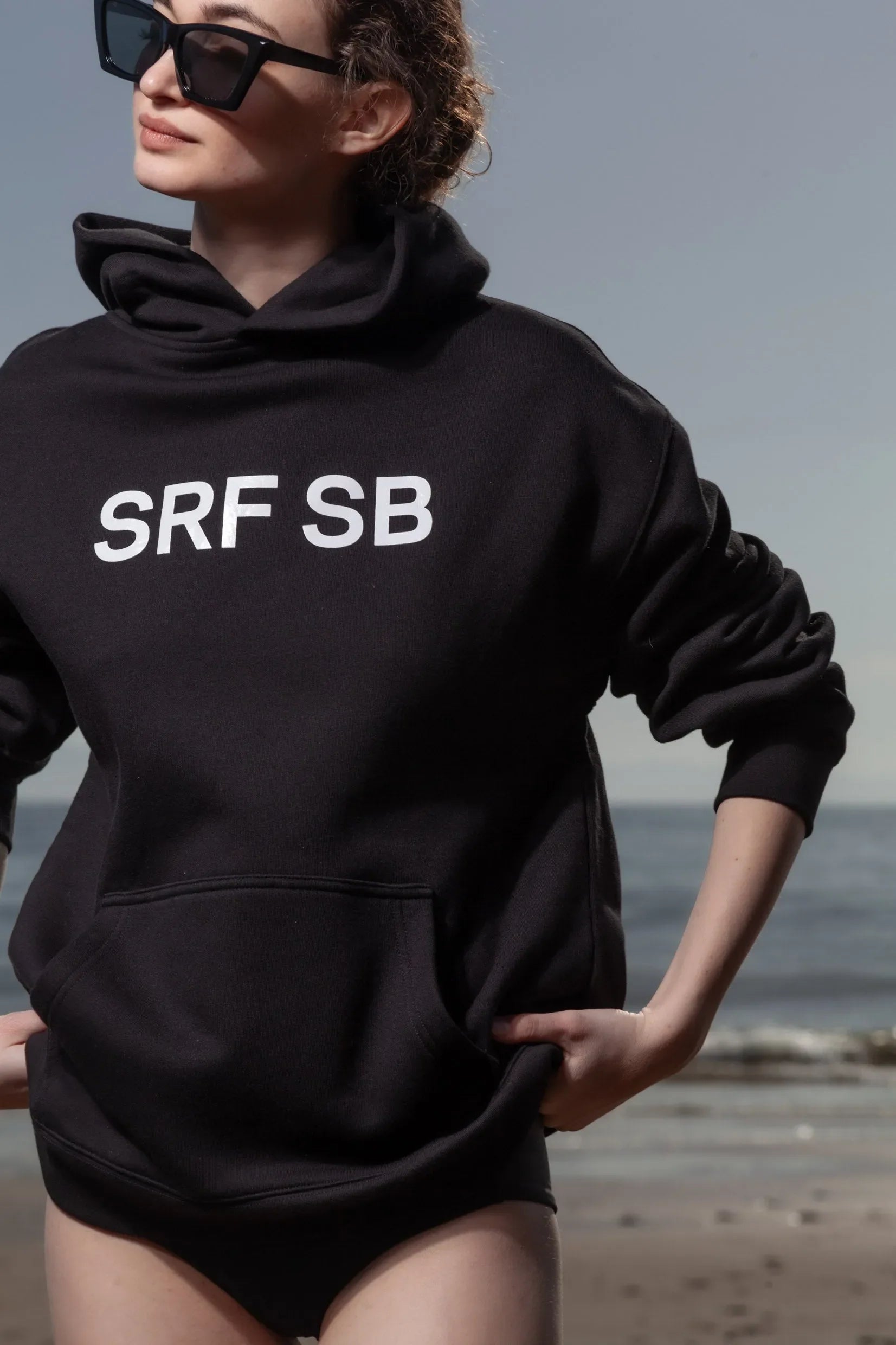 SRF SB Unisex Hoodie - Cream on Black - Heidi Merrick